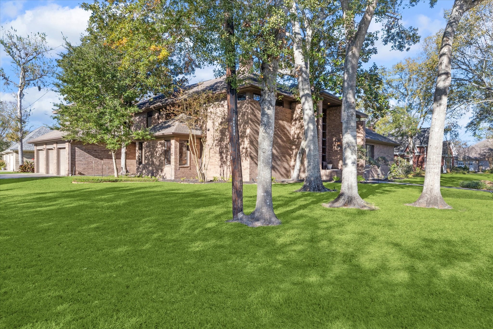 2614 Rip Van Winkle Drive Pearland, TX 77581 - Photo 31 of 31 a backyard of a house with lots of green space