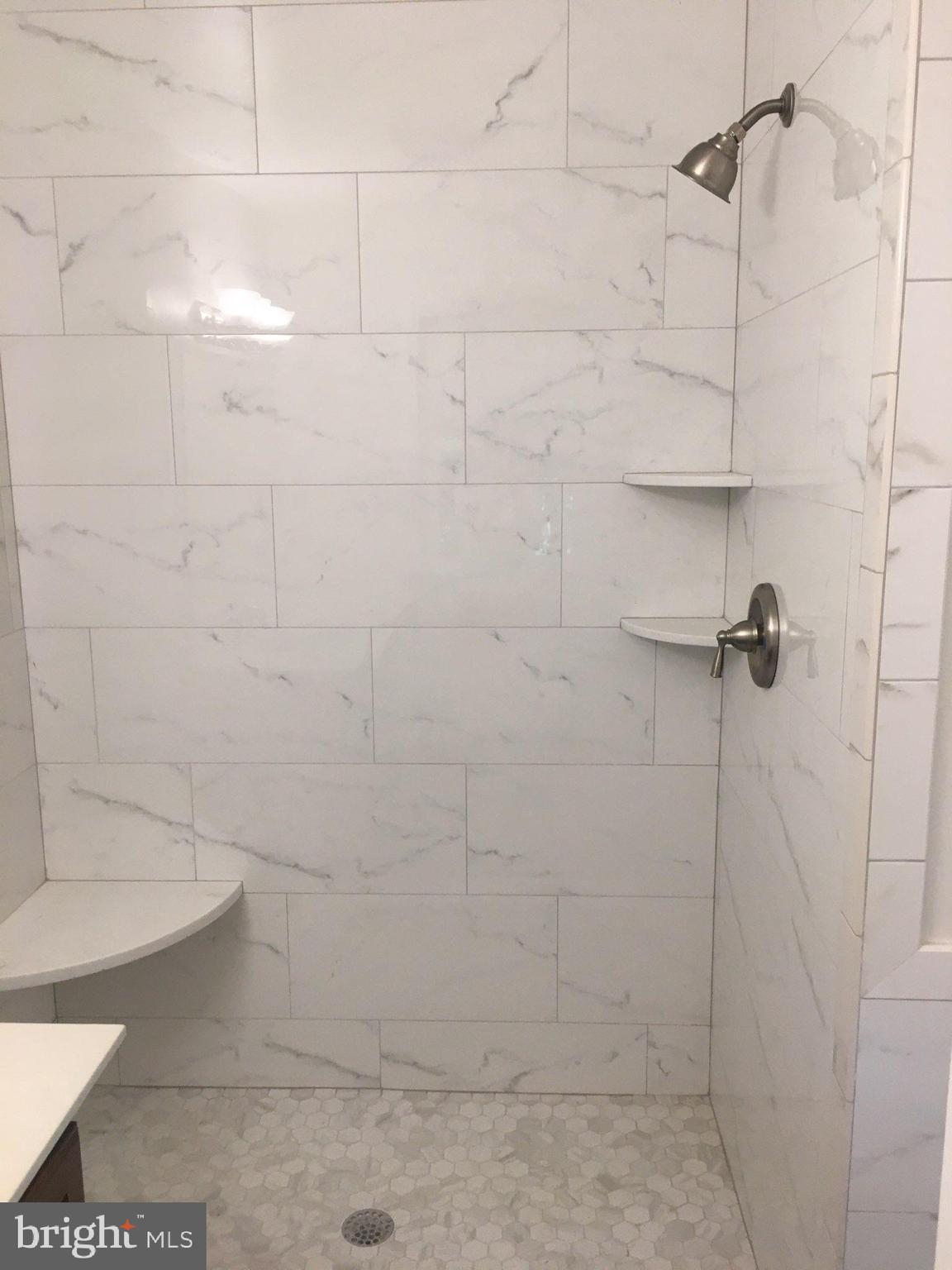 9840 Moyer Road Damascus, MD 20872 - Photo 8 of 20 New tile in both upstairs bathrooms