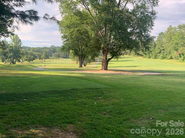 1-2 Country Club Road, Unit 1&2 Hendersonville, NC 28739 - Photo 7 of 10 a view of swimming pool with a yard and palm trees