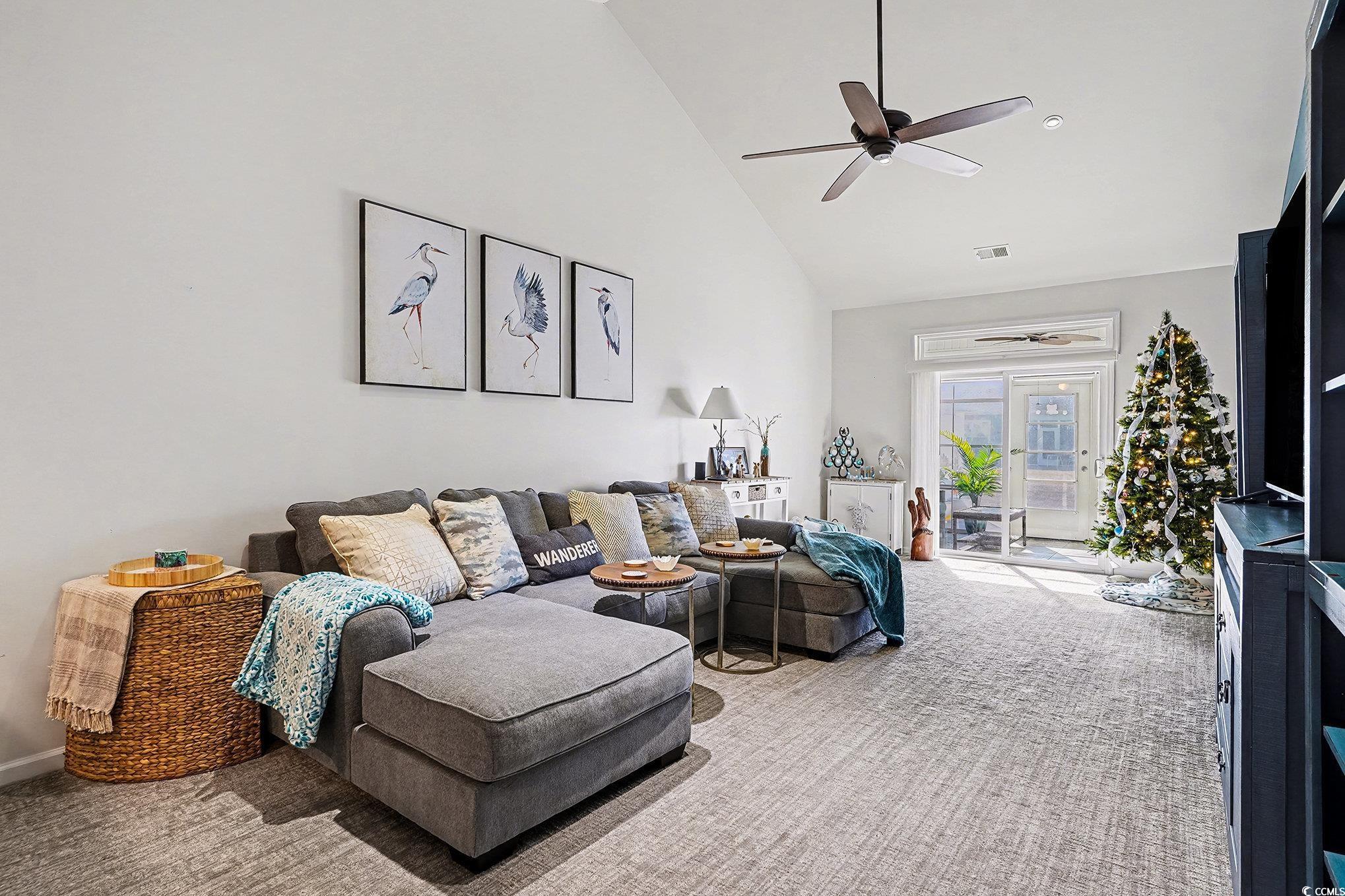 1526 Palmina Loop, Unit C Myrtle Beach, SC 29588 - Photo 12 of 34 Living room featuring high vaulted ceiling, ceiling fan, carpet flooring, and french doors