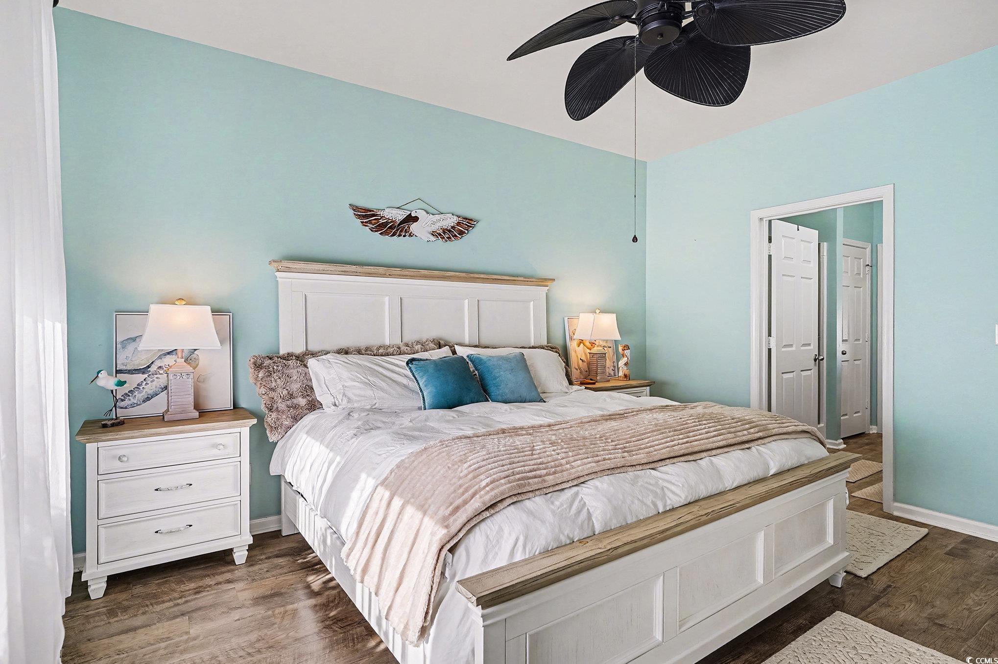 1526 Palmina Loop, Unit C Myrtle Beach, SC 29588 - Photo 14 of 34 Bedroom featuring dark wood-style flooring and ceiling fan