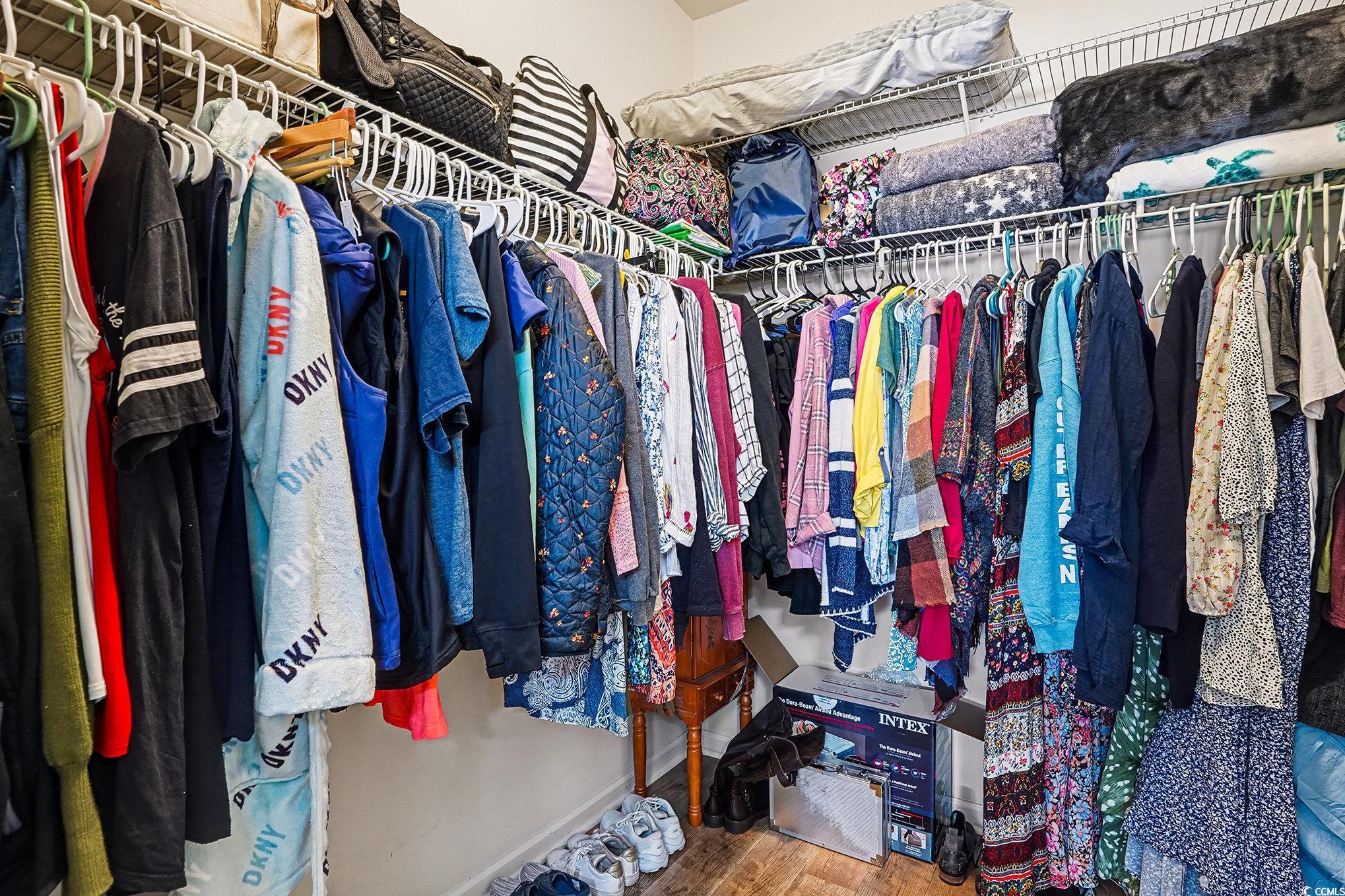 1526 Palmina Loop, Unit C Myrtle Beach, SC 29588 - Photo 20 of 34 Spacious closet featuring wood finished floors