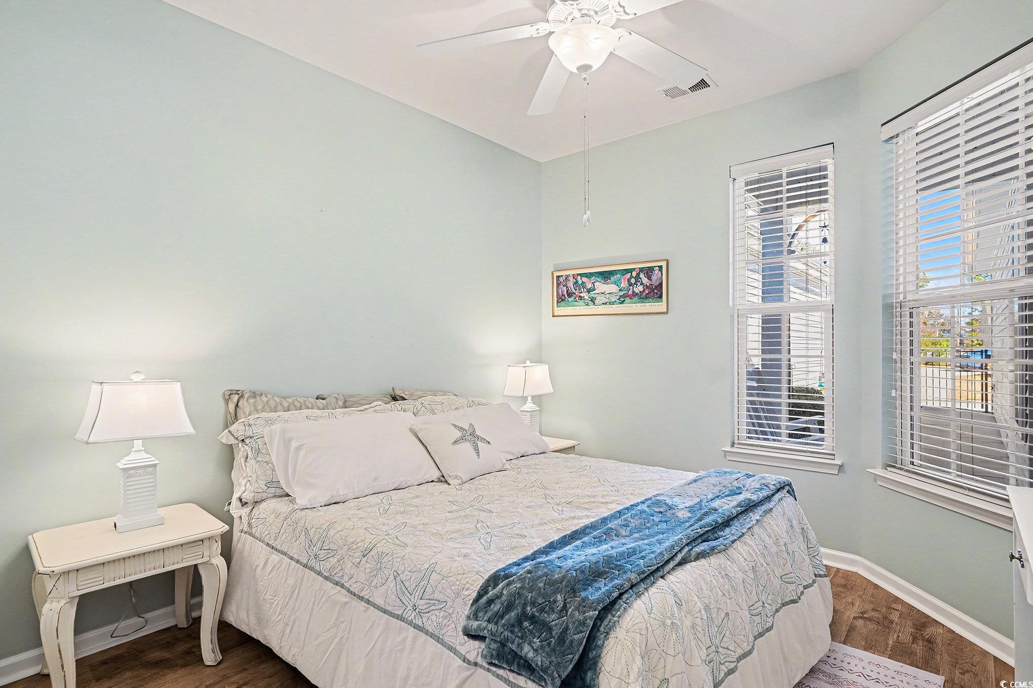 1526 Palmina Loop, Unit C Myrtle Beach, SC 29588 - Photo 21 of 34 Bedroom featuring wood finished floors, a ceiling fan, and lofted ceiling