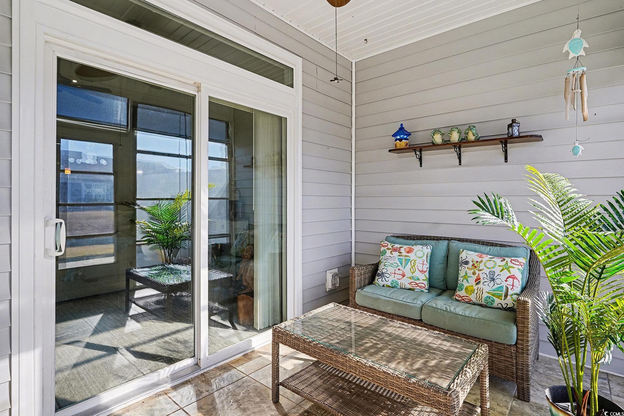 1526 Palmina Loop, Unit C Myrtle Beach, SC 29588 - Photo 27 of 34 Balcony featuring outdoor lounge area