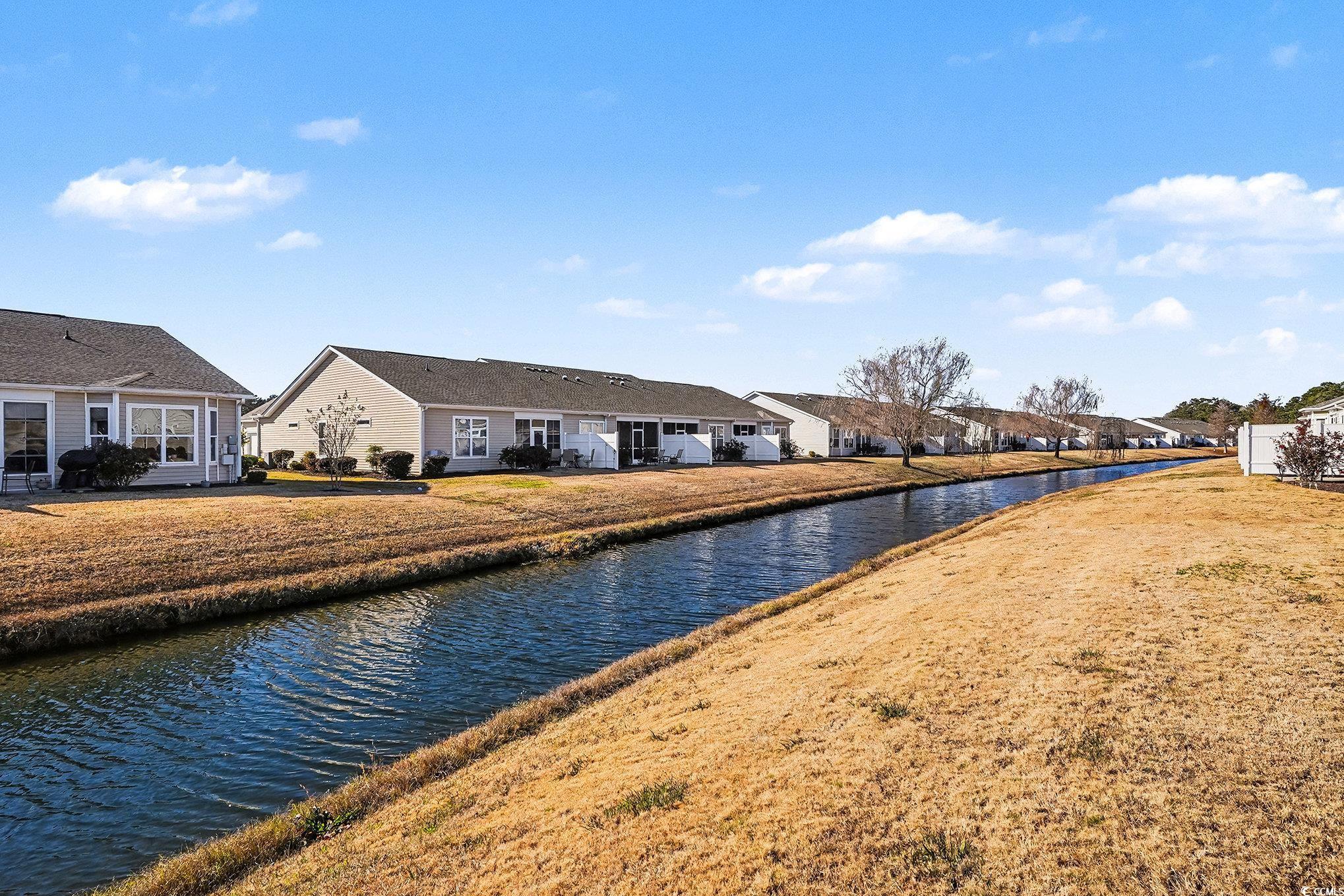 1526 Palmina Loop, Unit C Myrtle Beach, SC 29588 - Photo 31 of 34 Water view with nearby suburban area