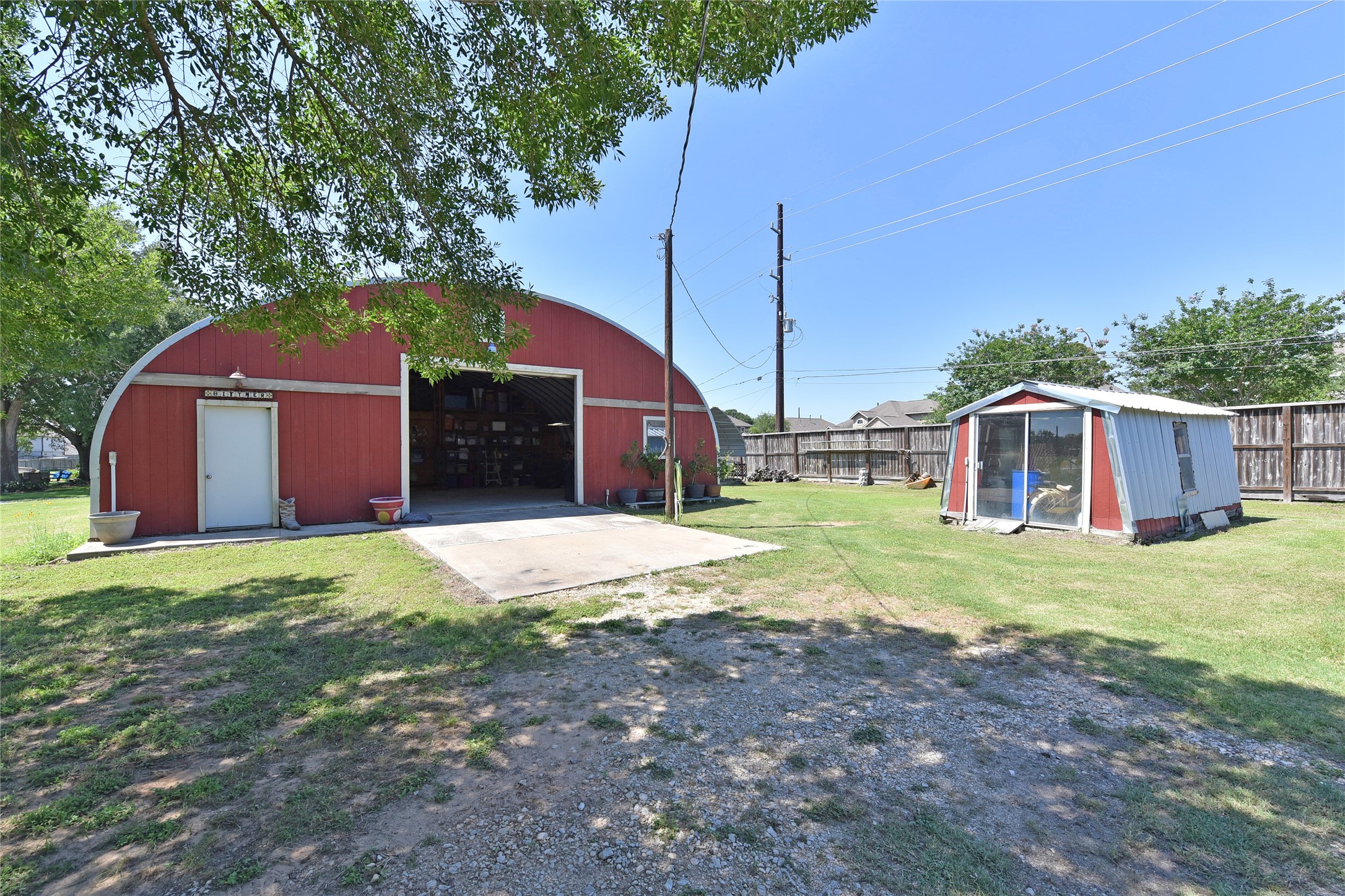 3221 Pecha Lane Rosenberg, TX 77471 - Photo 31 of 46 a front view of a house with a yard and garage