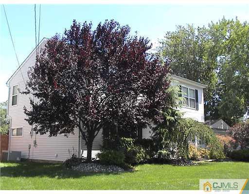 95 Winthrop Road Edison, NJ 08817 - Photo 3 of 25 a view of a house with a yard