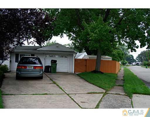95 Winthrop Road Edison, NJ 08817 - Photo 4 of 25 a view of a car parked in front of a house