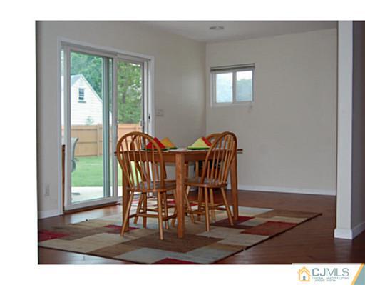 95 Winthrop Road Edison, NJ 08817 - Photo 7 of 25 a view of a dining room with furniture window and outside view
