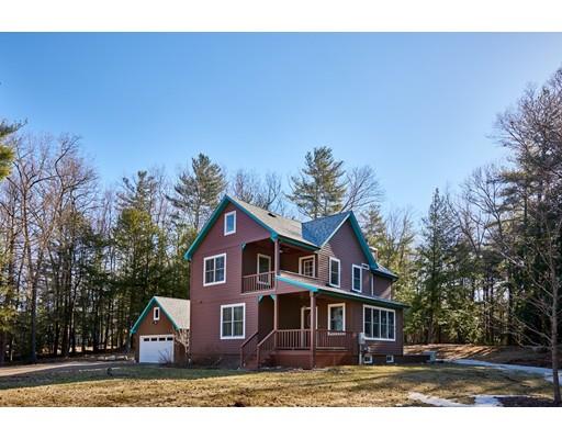 139 Brickyard Road Southampton, MA 01073 - Photo 1 of 29 a front view of a house with a yard