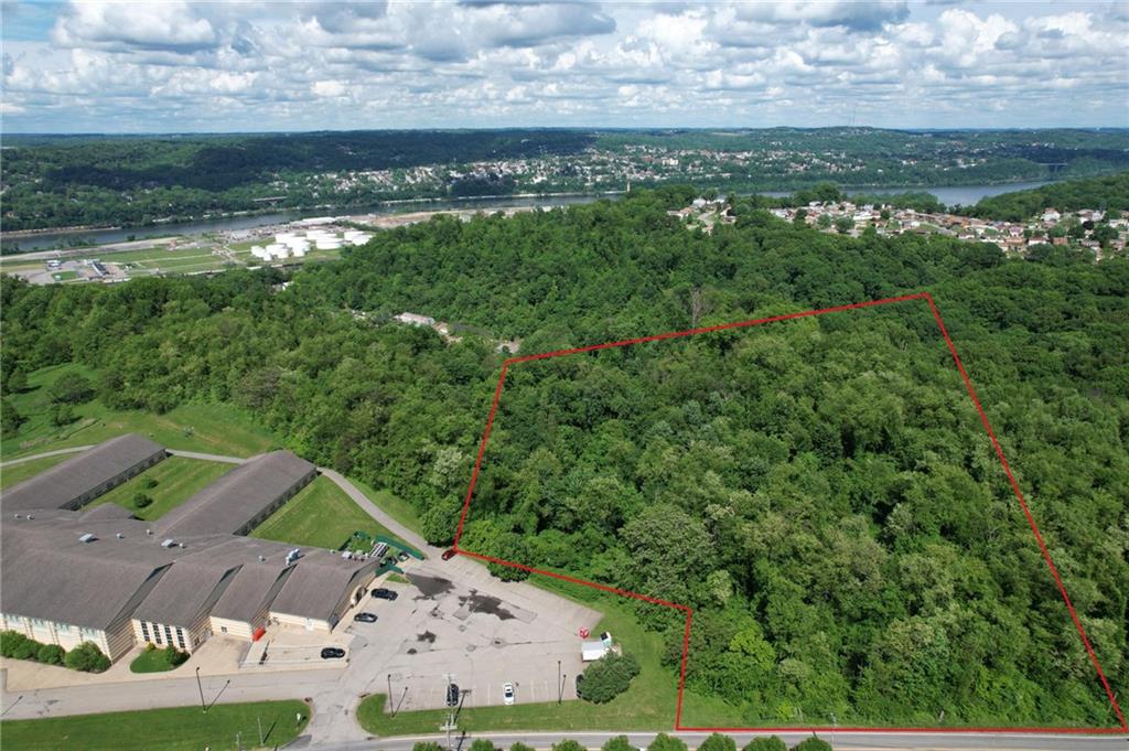 0 Spring Street McKees Rocks, PA 15136 - Photo 1 of 2 a view of a lake with a city