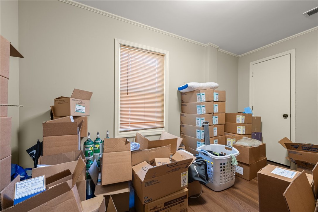 412 Sanders Street Anderson, SC 29624 - Photo 18 of 30 A versatile room with durable wood flooring, ideal for storage or future customization.