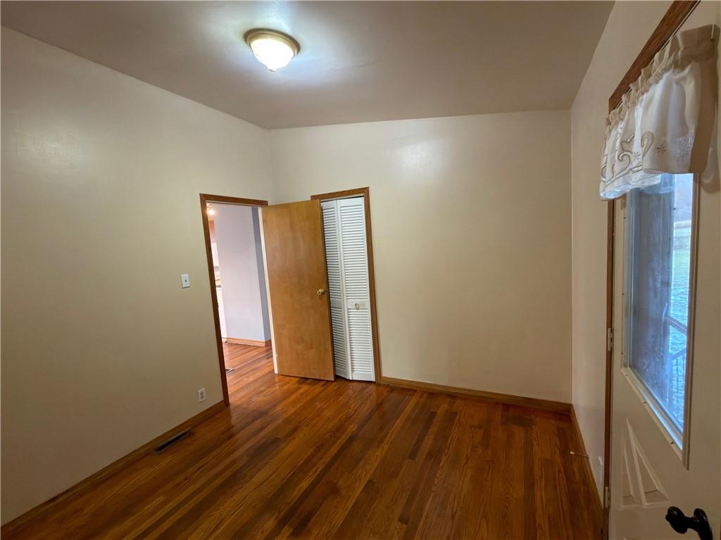 6964 Dermond Road Hermitage, PA 16148 - Photo 14 of 20 a view of hallway with wooden floor