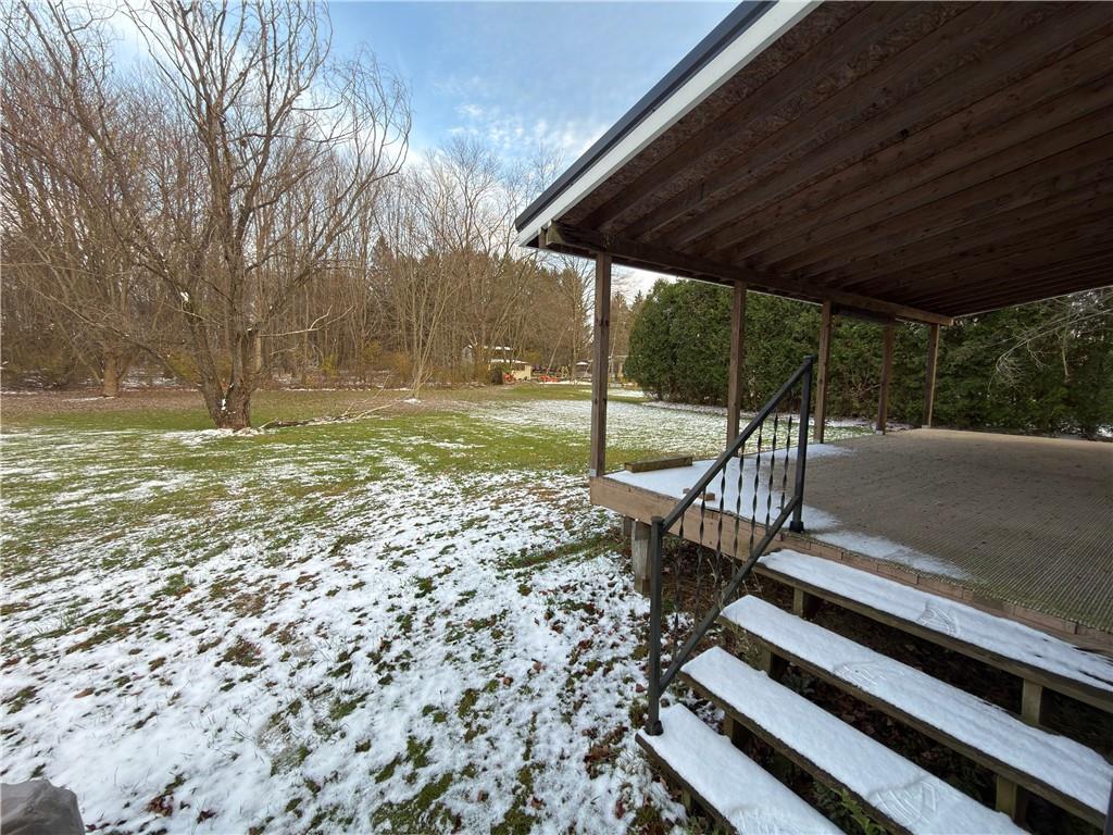 6964 Dermond Road Hermitage, PA 16148 - Photo 19 of 20 a view of a backyard with sitting area