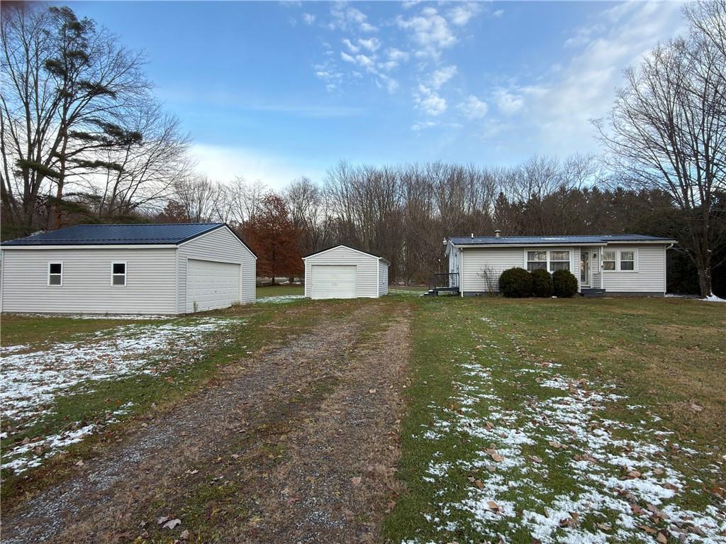6964 Dermond Road Hermitage, PA 16148 - Photo 2 of 20 a front view of house with yard and trees in the background