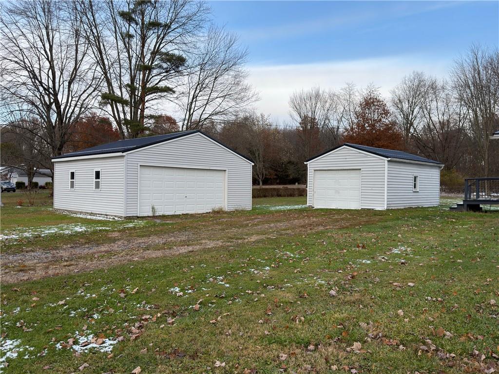 6964 Dermond Road Hermitage, PA 16148 - Photo 4 of 20 a front view of house with garden