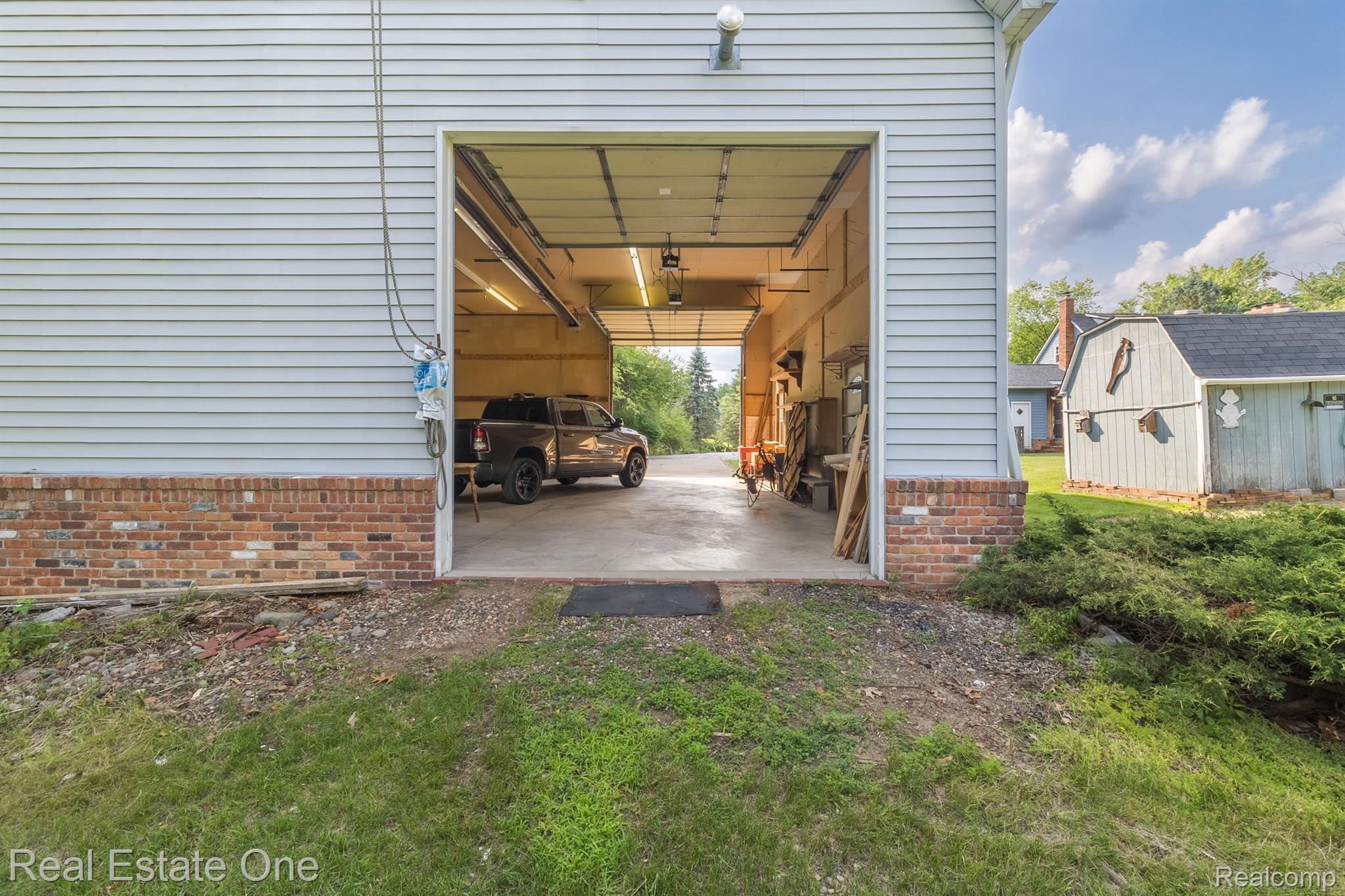 11260 Hartland Road Fenton, MI 48430 - Photo 54 of 73 AND Rear 12x12 door (+ 8x7 upper door not shown)