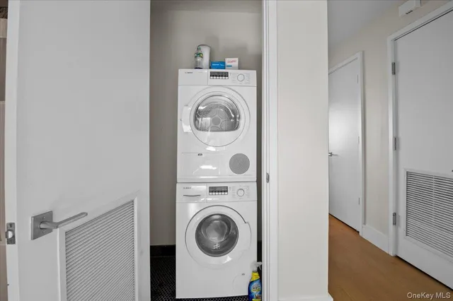 a utility room with dryer and washer