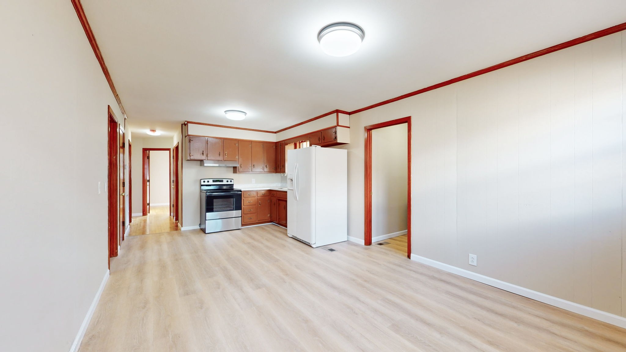 622 Mayview Drive Madison, TN 37115 - Photo 11 of 27 a view of a kitchen with a refrigerator and a window
