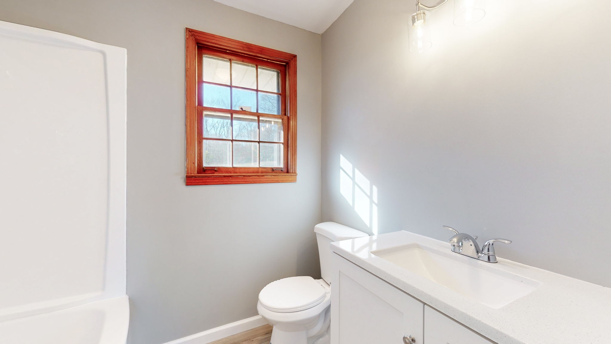 622 Mayview Drive Madison, TN 37115 - Photo 14 of 27 a white toilet sitting next to a bathroom sink