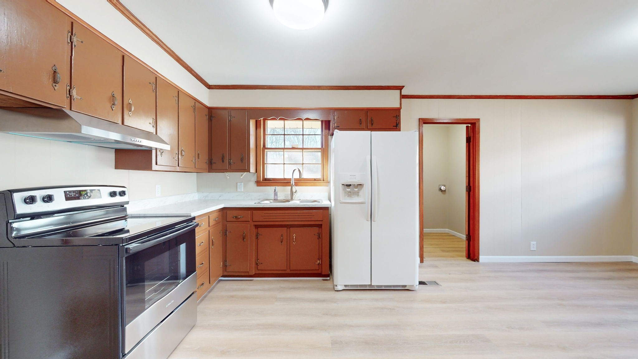 622 Mayview Drive Madison, TN 37115 - Photo 3 of 27 a kitchen with stainless steel appliances granite countertop a refrigerator and a stove top oven