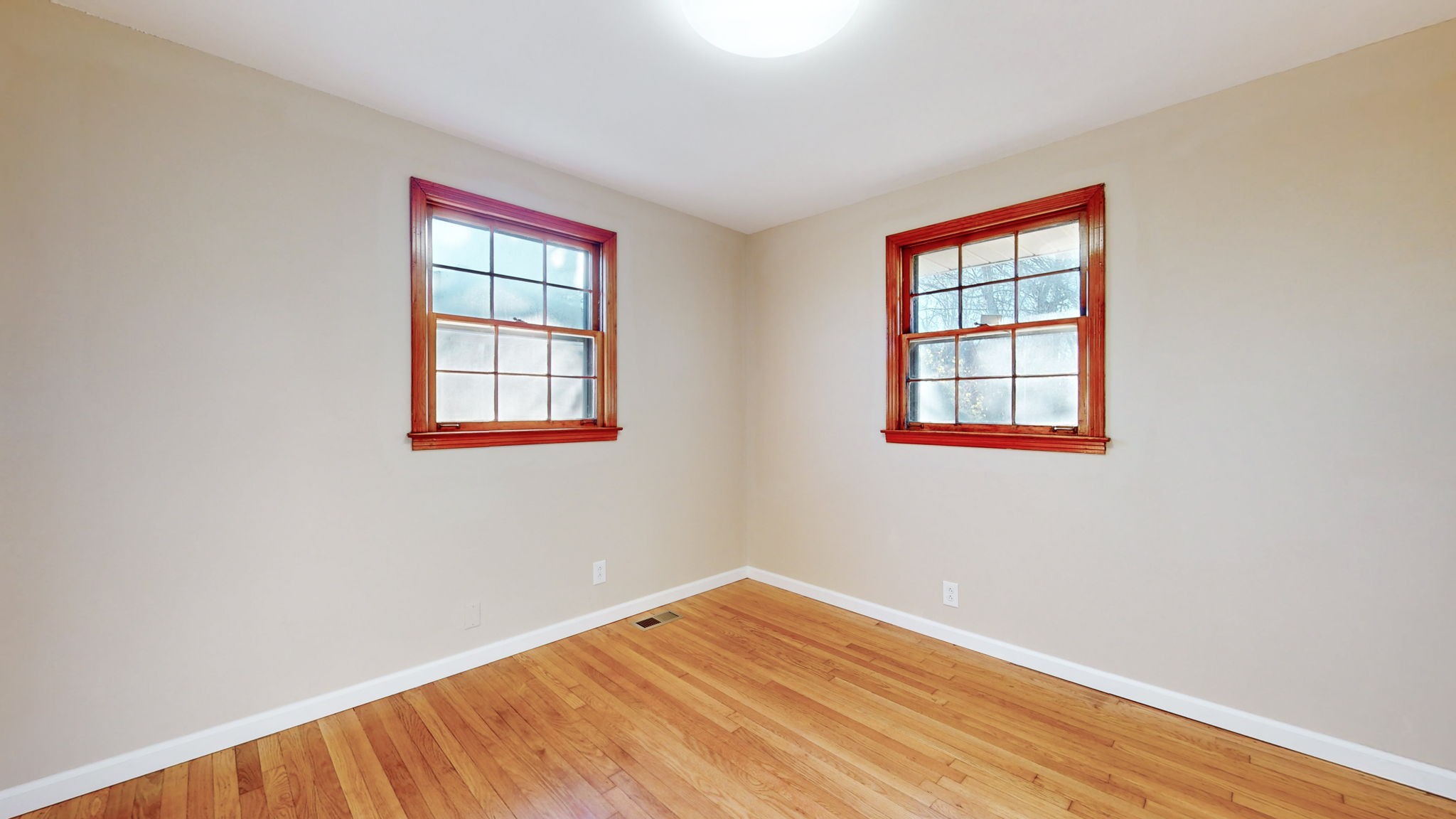 622 Mayview Drive Madison, TN 37115 - Photo 4 of 27 a view of an empty room with wooden floor and a window
