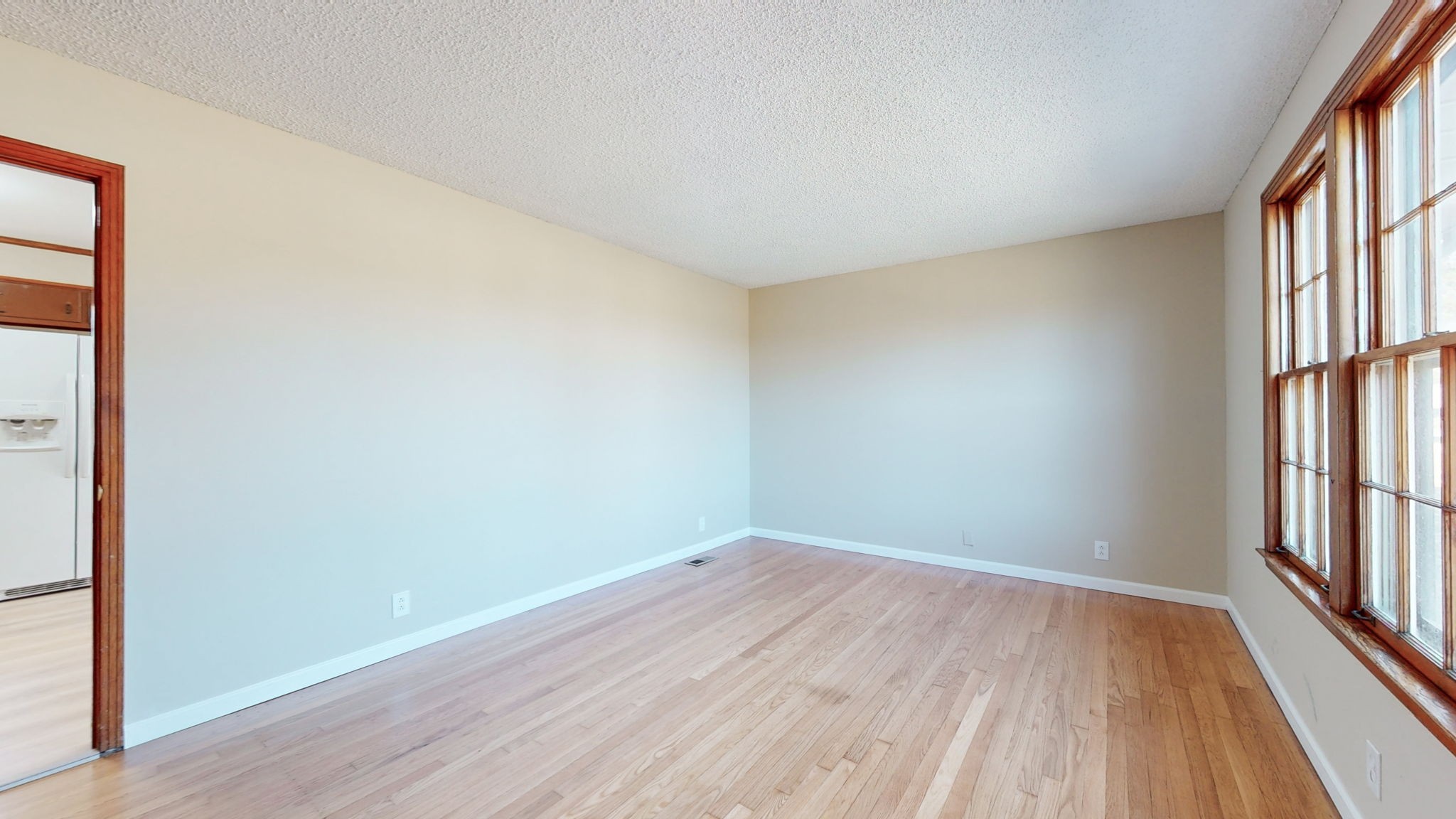 622 Mayview Drive Madison, TN 37115 - Photo 5 of 27 an empty room with wooden floor and windows