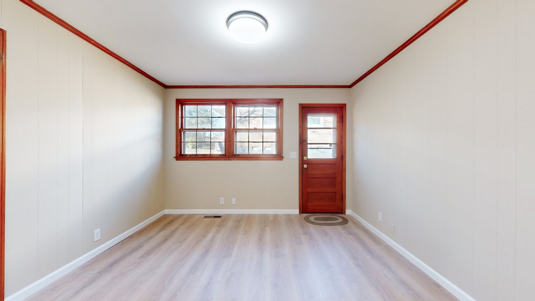 622 Mayview Drive Madison, TN 37115 - Photo 10 of 27 an empty room with wooden floor and windows