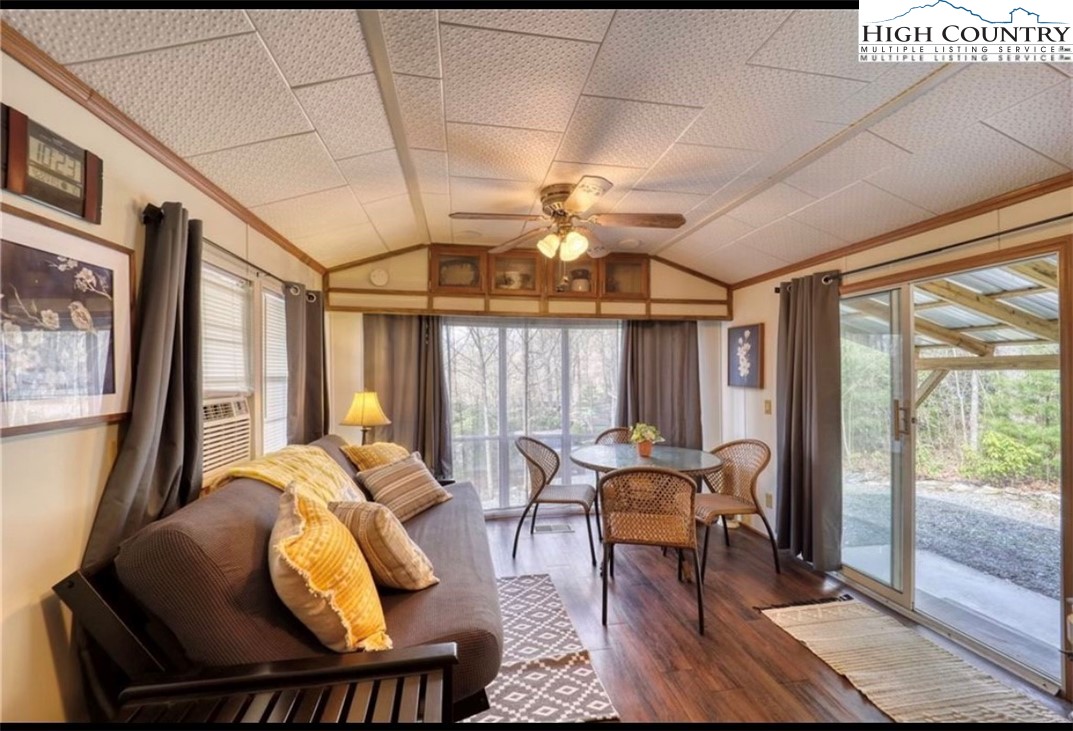85 Jack Pine Loop Newland, NC 28657 - Photo 16 of 20 a living room with furniture and a large window