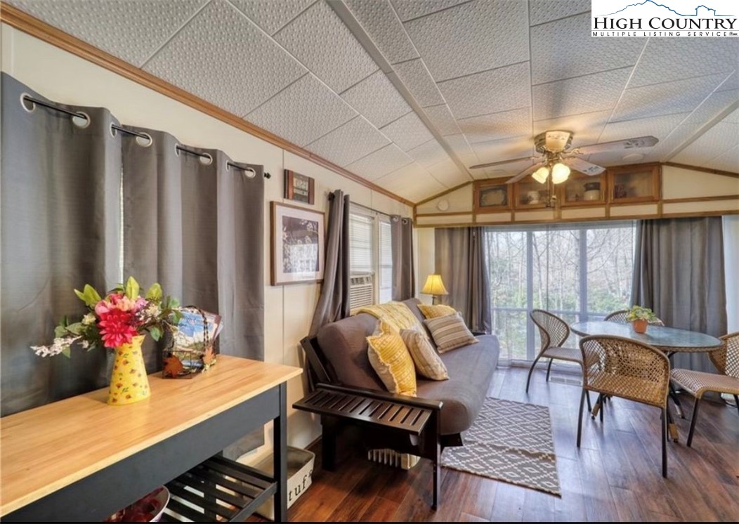 85 Jack Pine Loop Newland, NC 28657 - Photo 17 of 20 a view of a dining room with furniture window and outside view
