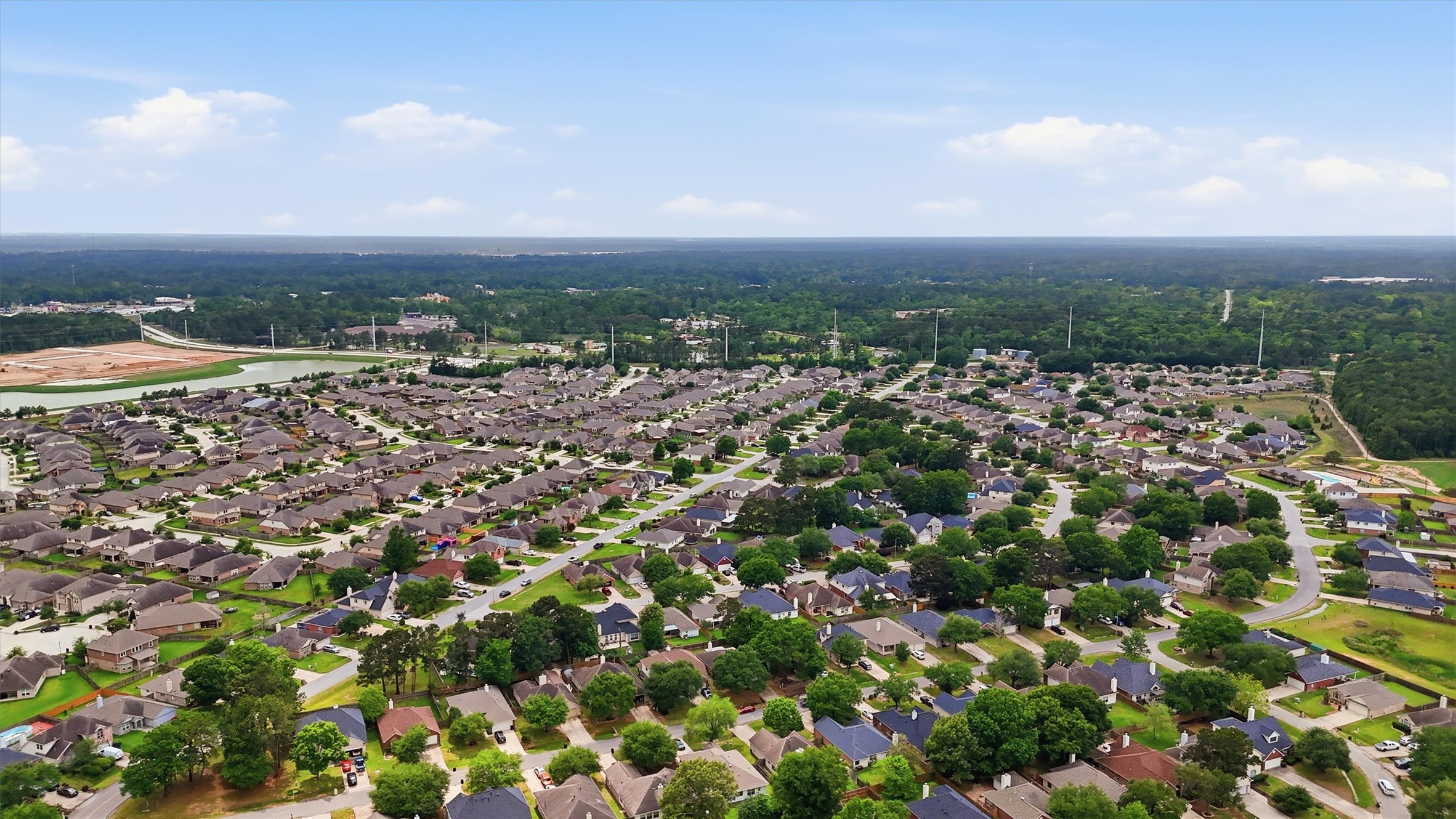 21543 Forest Colony Drive Porter, TX 77365 - Photo 29 of 32 Near Valley Ranch a shopping complex of the highest order, lots of restaurants, food and Drug stores, terrific MoviePlex with the latest in cinema comfort all within one mile of this home.