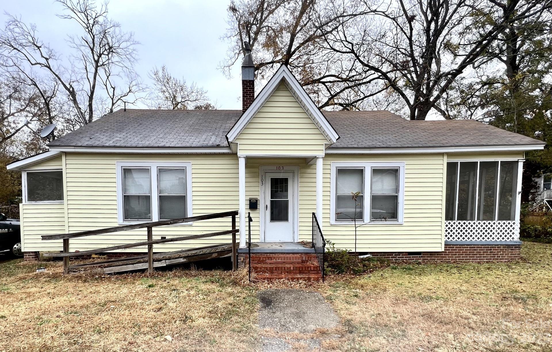 103 Walker Street Chester, SC 29706 - Photo 1 of 1 a front view of a house with a yard