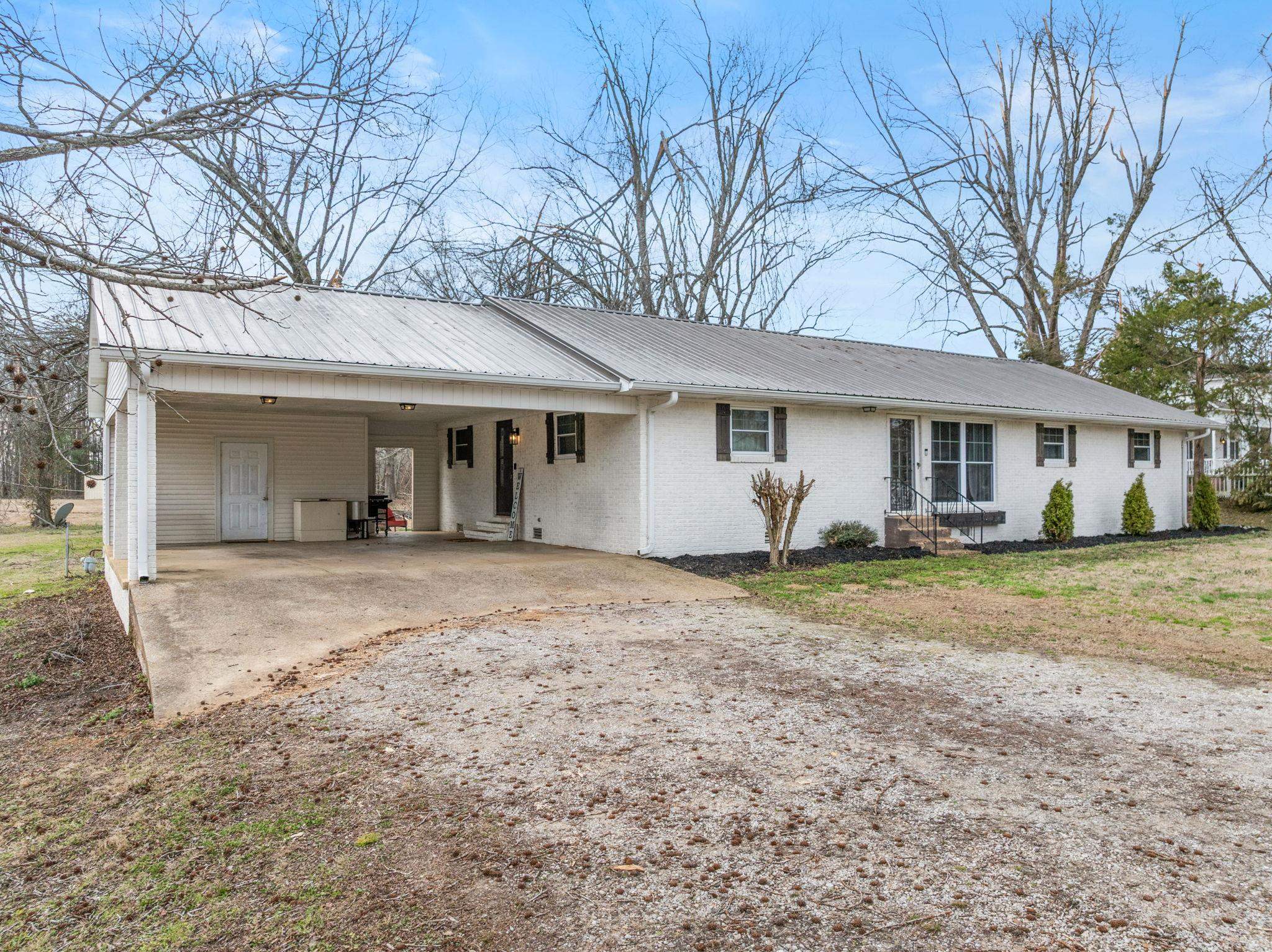 12 County Road 512 Corinth, MS 38834 - Photo 13 of 39 a view of a house with a yard and large tree