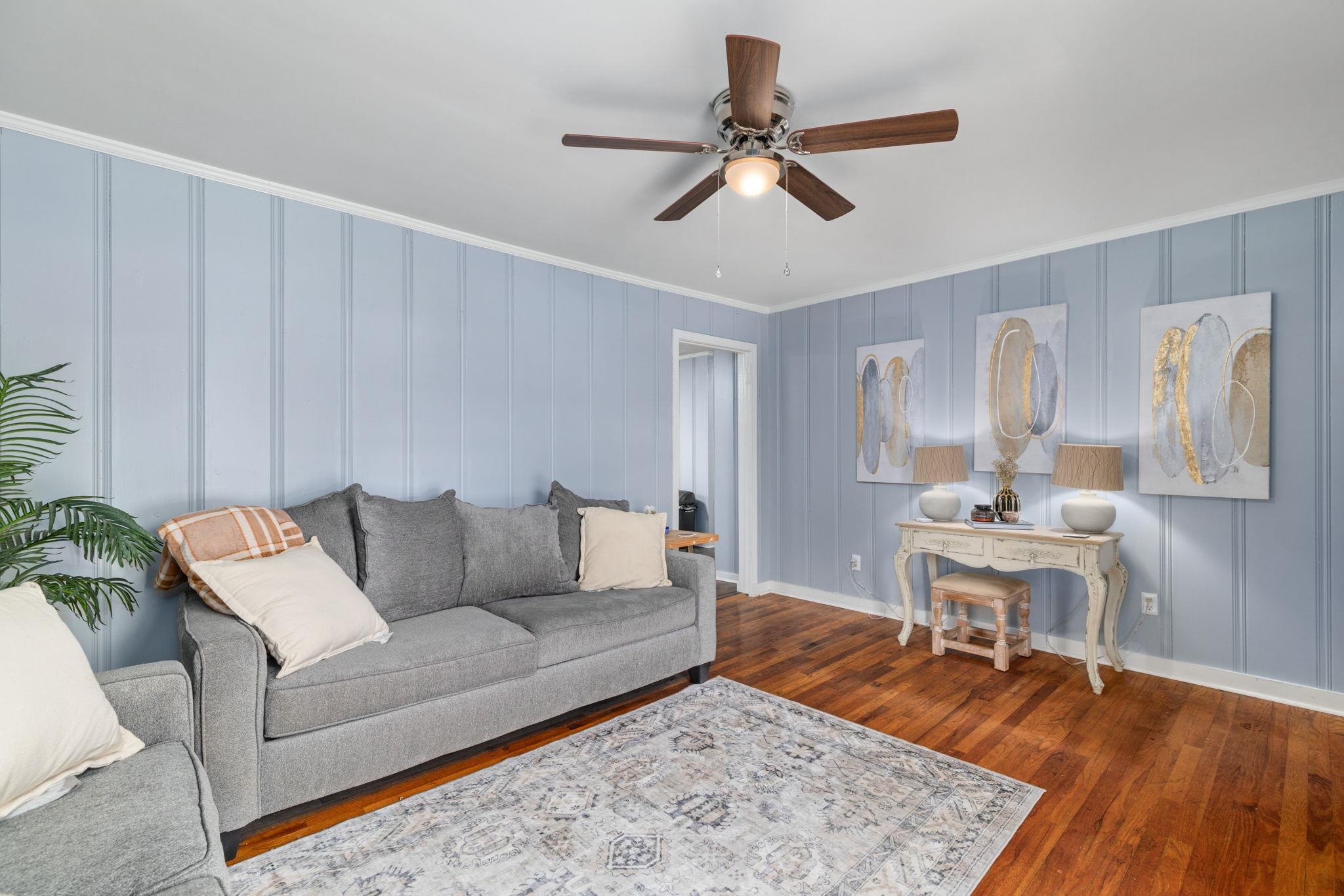 12 County Road 512 Corinth, MS 38834 - Photo 15 of 39 a living room with furniture and a wooden floor