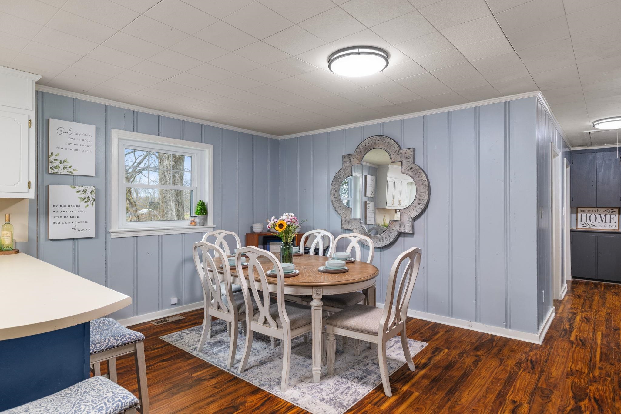 12 County Road 512 Corinth, MS 38834 - Photo 29 of 39 a view of a dining room with furniture window and wooden floor