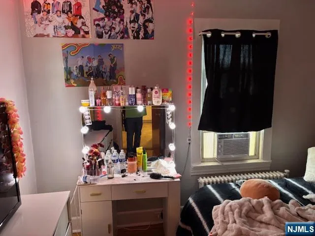 a room with furniture and a mirror