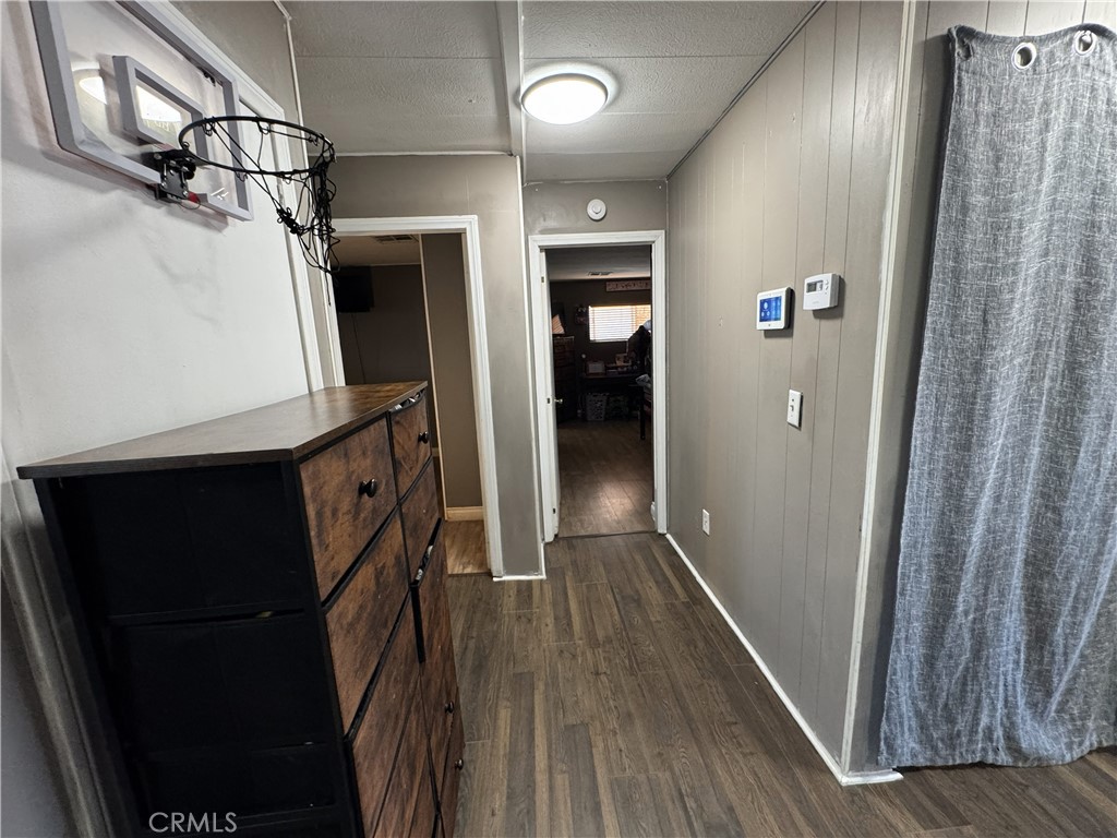 1025 South Riverside Avenue, Unit 66 Rialto, CA 92376 - Photo 22 of 53 a view of hallway with wooden floor