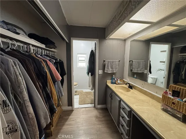 a view of a kitchen with a sink and dishwasher