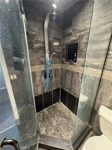 a bathroom with a sink and toilet