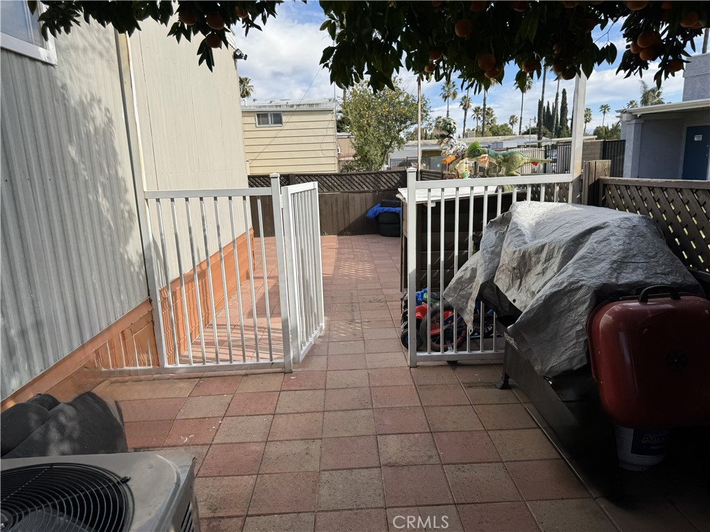 1025 South Riverside Avenue, Unit 66 Rialto, CA 92376 - Photo 40 of 53 a view of balcony with furniture