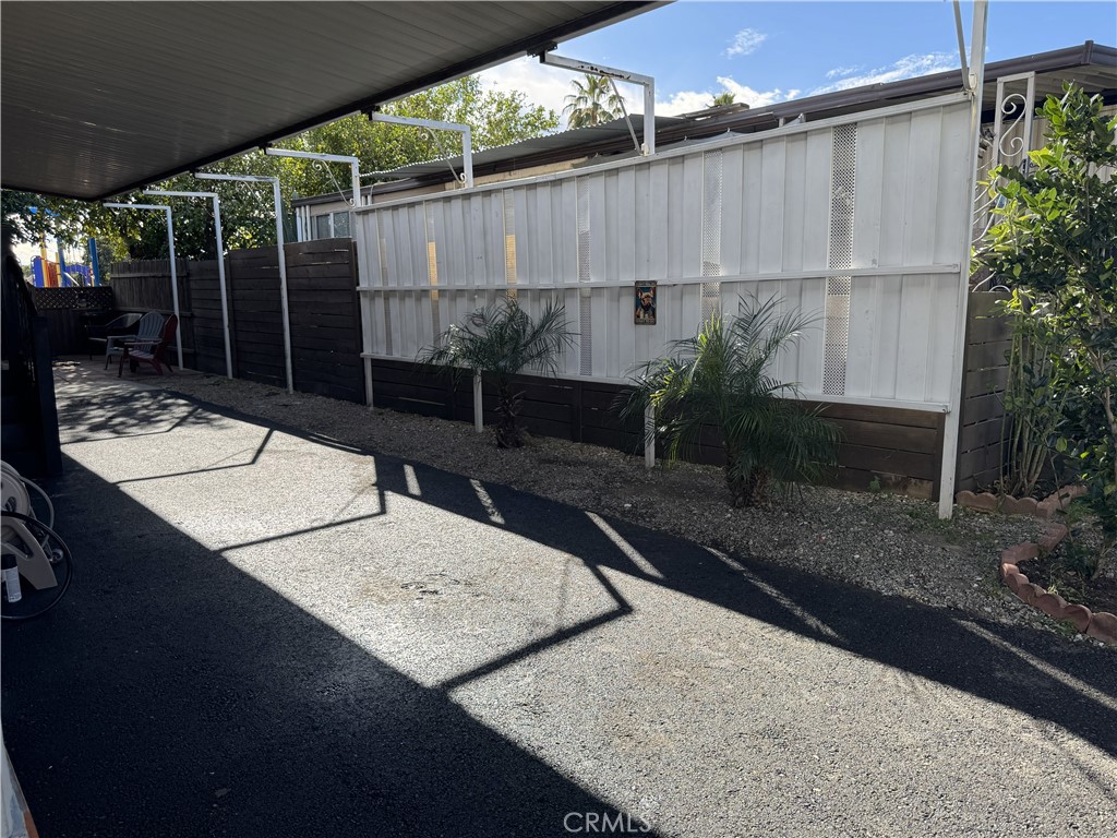 1025 South Riverside Avenue, Unit 66 Rialto, CA 92376 - Photo 47 of 53 a view of a backyard