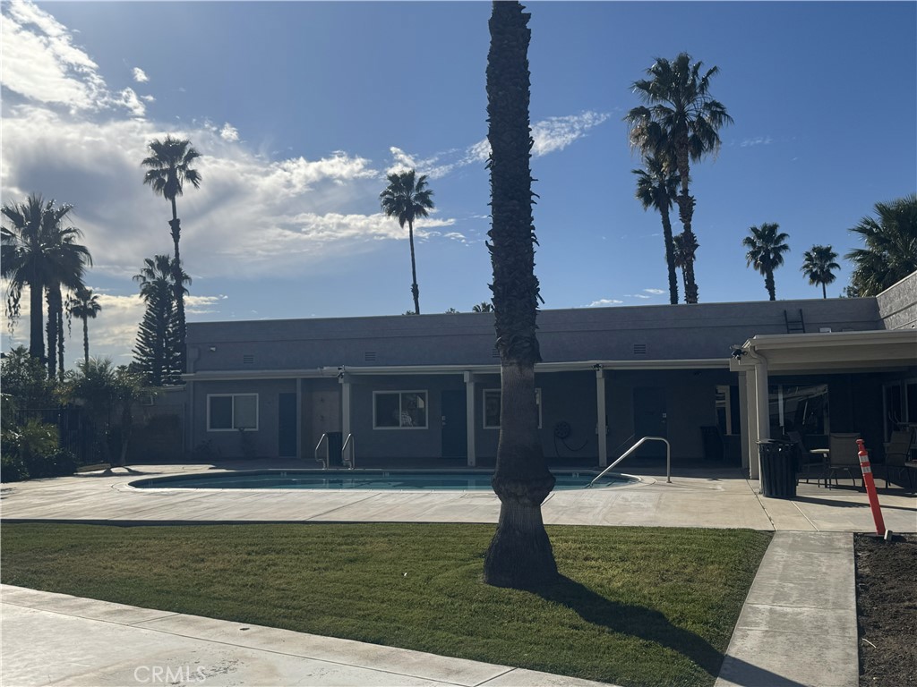 1025 South Riverside Avenue, Unit 66 Rialto, CA 92376 - Photo 51 of 53 a front view of a house with garden