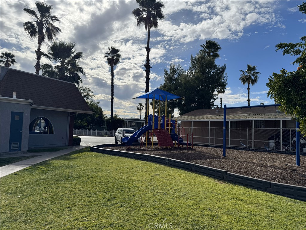1025 South Riverside Avenue, Unit 66 Rialto, CA 92376 - Photo 53 of 53 a view of a house with backyard and porch