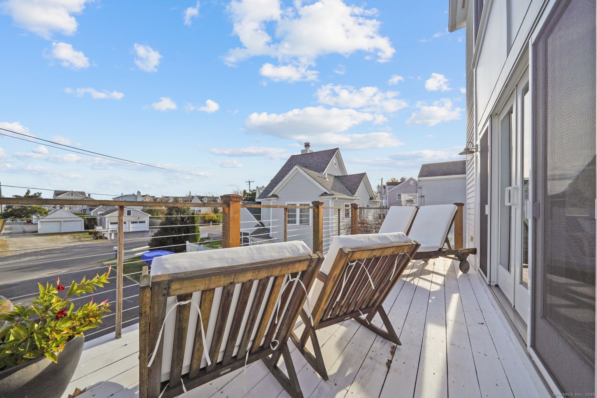 656 Fairfield Beach Road Fairfield, CT 06824 - Photo 20 of 30 a view of balcony with furniture