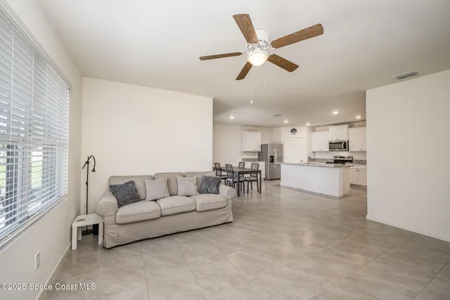 a view of a workspace with furniture