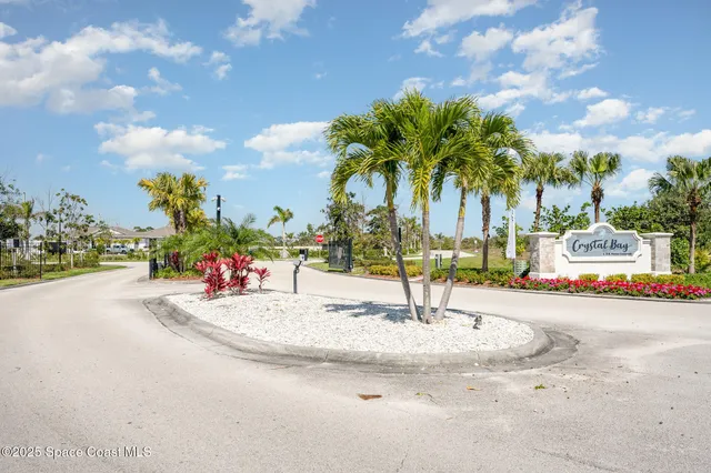 an aerial view of a house with a swimming pool
