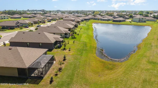a kitchen with a sink stove and refrigerator