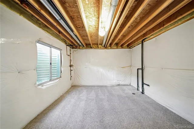 a view of empty room with windows