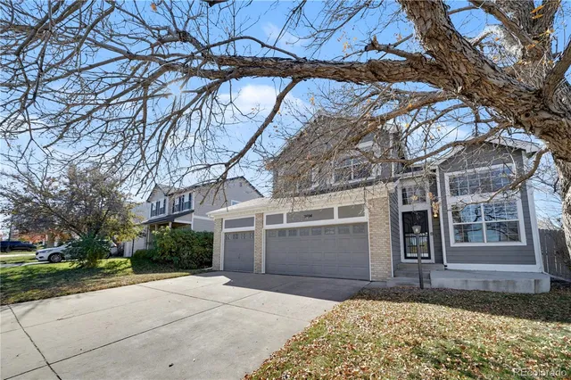 a house view with a backyard space