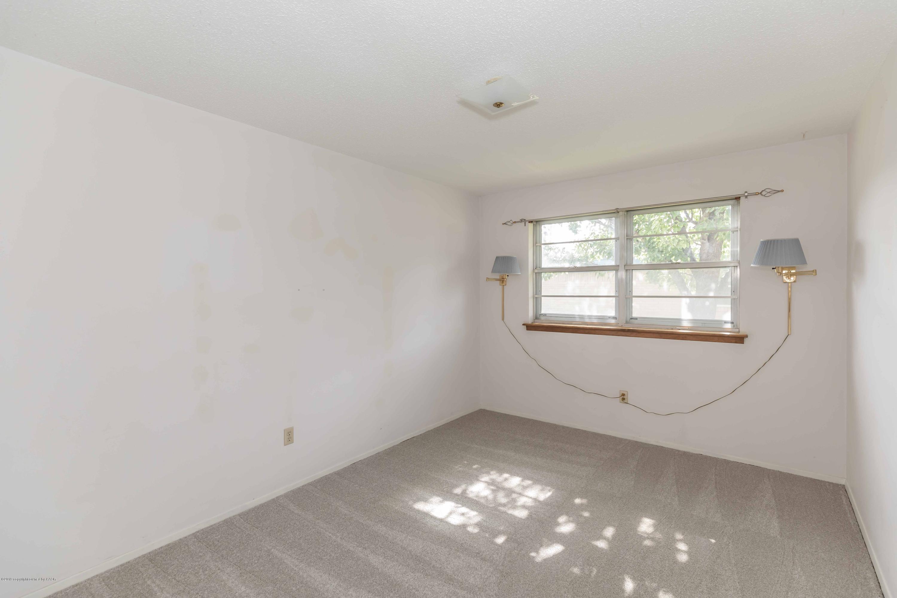 7206 Gainsborough Road Amarillo, TX 79106 - Photo 28 of 41 a view of an empty room with a window